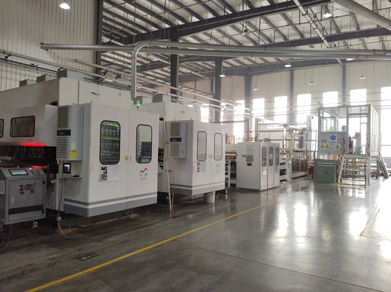 Automated production line for corrugated packaging manufacturing
