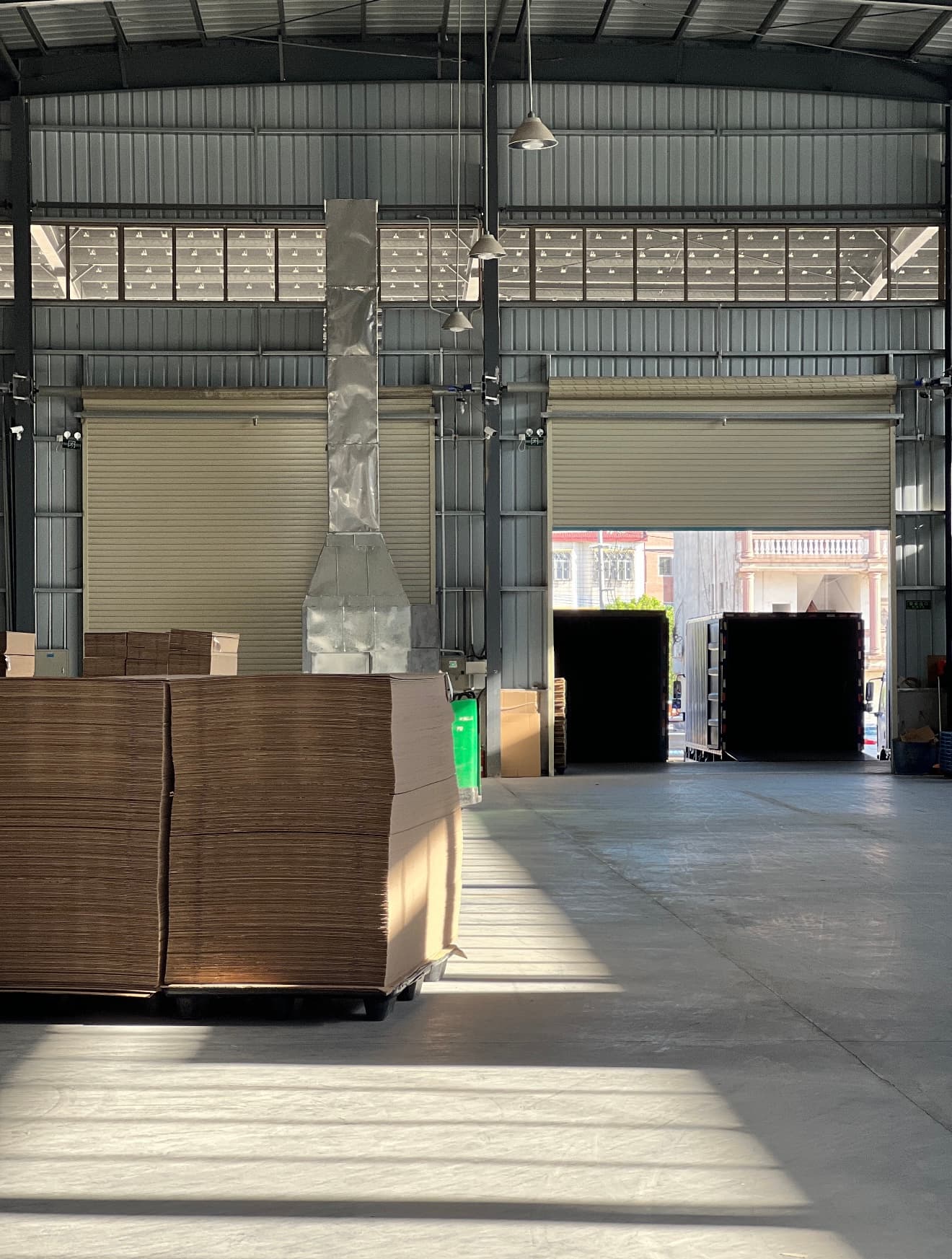 Warehouse area for packaging materials and finished corrugated products